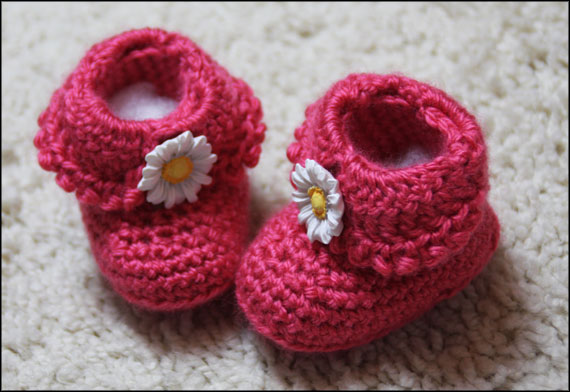 pink booties with daisy buttons