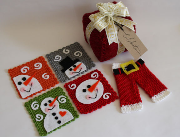 christmas decorations made with 4" pin loom woven squares