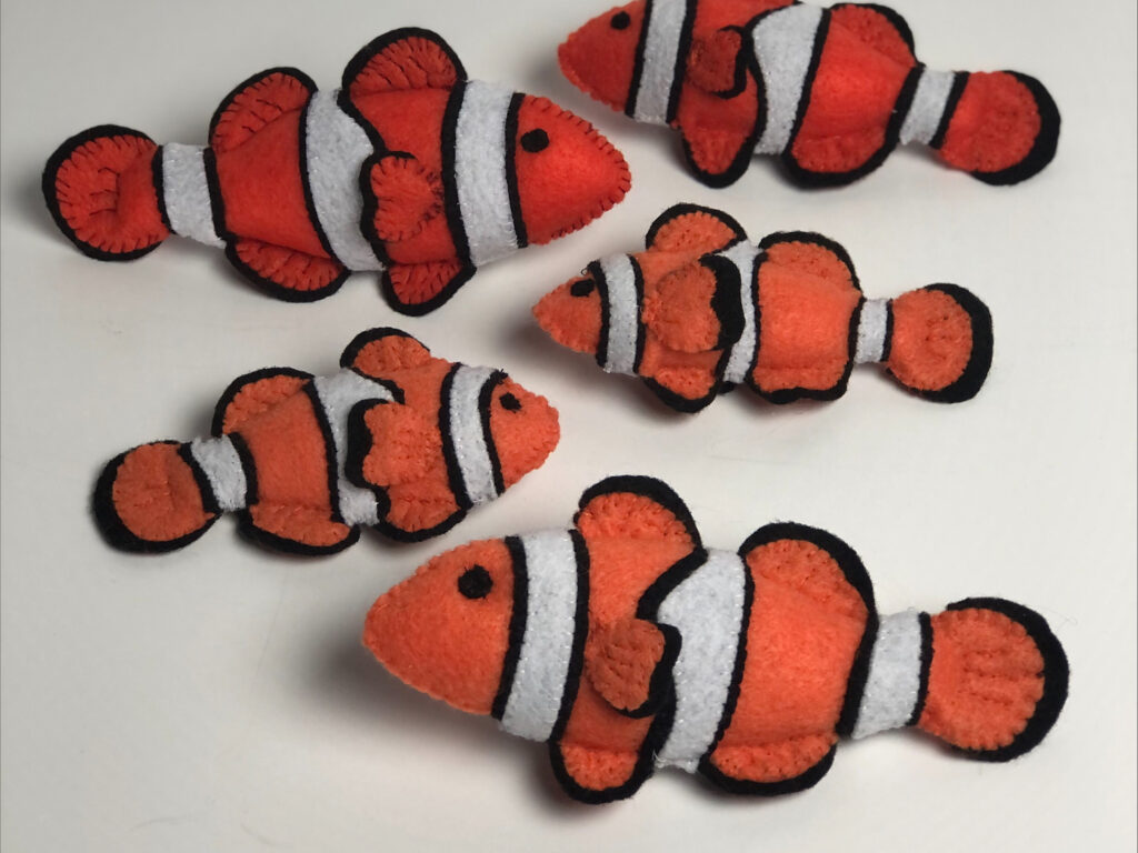 A school of hand sewn clownfish